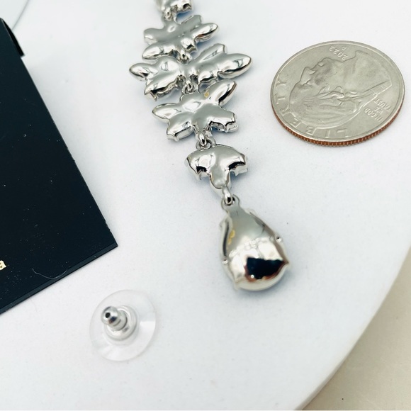 Givenchy silver tone blue crystal flower drop statement earrings firm price